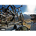 4 x Thule ProRide 591 bike carriers with locking roof bars