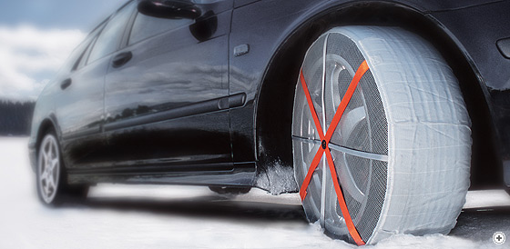 AutoSock/Auto Sock - textile wheel covers with an elasticated edge; you just slip them over the driving wheels when you find yourself getting stuck. ("Yes - it really is this easy" and "Yes, of course they work!")