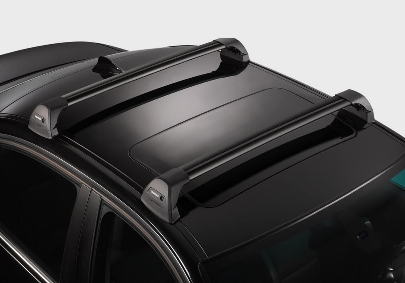 VW T-Roc (18 on) for cars with roof rails:Yakima roof bars package - S25  black bars with K328 kit.