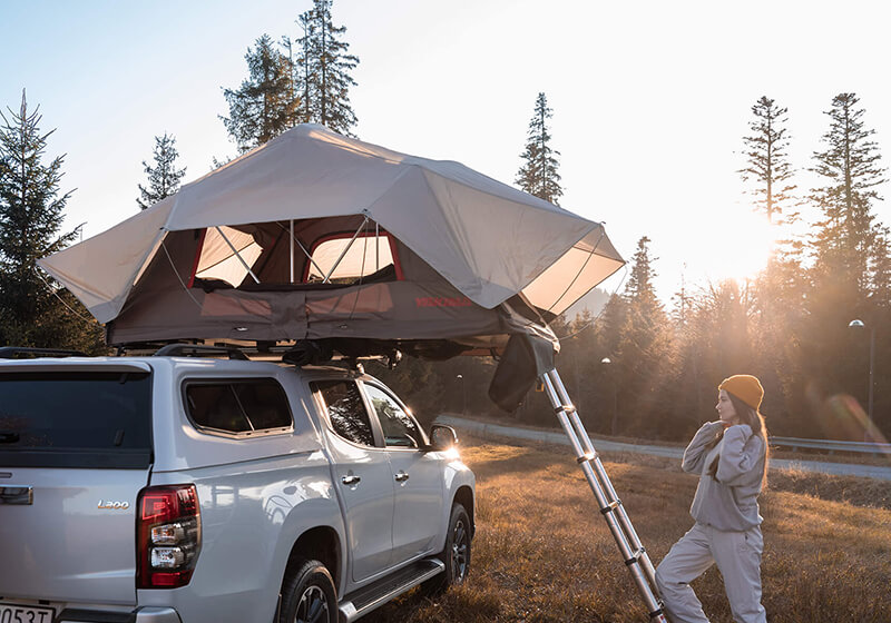 yakima skyrise on roof tents on vehicles by the sea